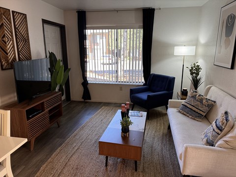 a living room with a couch and a coffee table